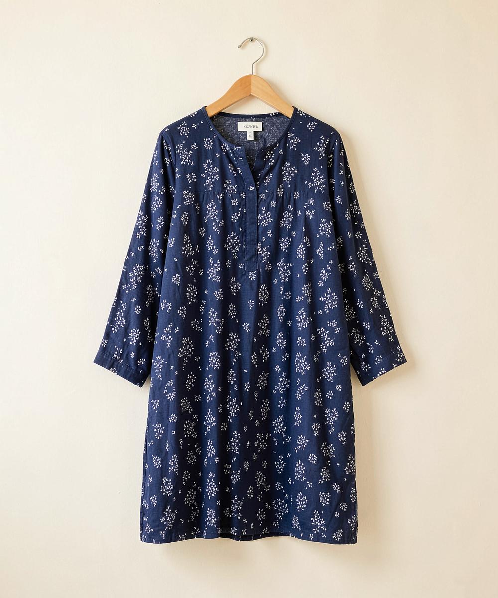 A printed kurti on a hanger